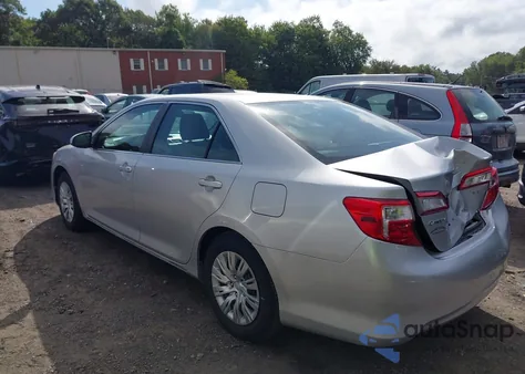 2014 Toyota Camry Le z USA, uszkodzony, nr VIN 4T4BF1FK7ER382583